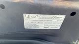 Label showing vehicle emission control information for a 2018 Hyundai Sonata with details about fuel type and regulations
