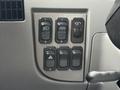 Control panel with six toggle switches for various functions in a 2016 Peterbilt 348 truck