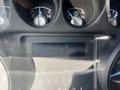 Dashboard display showing gauges and a digital readout in a 2016 Ford F-250 SD