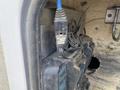 A 2015 Ford F-550 with a dirty exterior and visible wiring connected to equipment inside the vehicle
