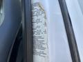 A close-up of a sticker on a 2016 Ford F-750 detailing vehicle specifications including tire pressure and weight limits