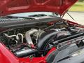 2007 Ford F-550 engine compartment showing various components including the air intake manifold and battery