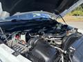 A 2018 RAM 3500 truck engine with various components visible including the air intake and fluid reservoirs