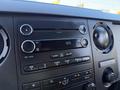 Dashboard of a 2017 Ford F-650 Super Duty showing radio controls and display with time reading 9:25