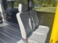 Interior seating of a 2022 RAM Promaster 350 featuring two grey upholstered seats positioned side by side with seatbelts