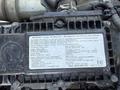 A rectangular engine control unit with detailed specifications and instructions printed on it for a 2014 Hino 195 truck