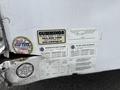 2016 Continental cargo trailer with visible manufacturer and compliance labels along with tire and loading information stickers