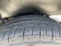 Close-up of a tire from a 2017 Chevrolet Colorado showing tread patterns and details of the rubber surface