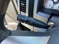 A control stalk from a 2015 RAM 1500 featuring settings for windshield wipers with icons indicating mist and intermittent functions