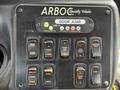 Control panel for a 2018 Chevrolet Express featuring various buttons labeled for door operation interior lights ramp functions and other vehicle controls