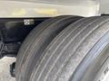 Close-up of the rear wheels of a 2025 Peterbilt 536 showing tread patterns and tire details