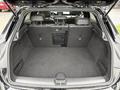 Interior trunk space of a 2016 Mercedes-Benz GLA-250 with a clean and spacious design featuring a flat loading floor and side storage nets