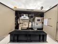 A 2005 Katolight SED60FPJ4 generator with a visible engine and control panel inside a metal enclosure
