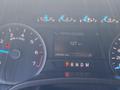 Dashboard of a 2019 Ford F-150 displaying speedometer and distance to empty with a reading of 127 km and odometer at 293092.3 km