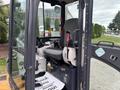 2017 John Deere 50G excavator with a spacious operator's seat and controls for maneuvering the machine