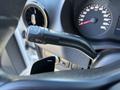 Close-up of the control stalk on the steering column of a 2021 Mercedes-Benz Sprinter 2500 featuring wiper and turn signal controls