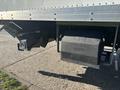 A 2022 Lion Lion6 electric truck with a visible black battery compartment mounted underneath the chassis