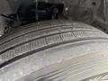 Close-up of a tire from a 2017 Ford F-750 showing tread patterns and wear on the rubber surface