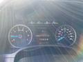 Dashboard of a 2018 Ford F-150 showing speedometer and odometer with illuminated gauges and a digital speedometer display