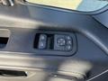 Control panel with window switches and mirror adjustments on the interior door of a 2024 Mercedes-Benz Sprinter 2500