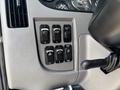 Control panel of a 2020 Peterbilt 330 featuring various switches for lights and functions alongside a start and stop button