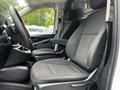 Interior of a 2020 Mercedes-Benz Metris showing front seats and dashboard with a steering wheel and control panel