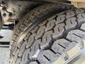 Close-up of a tire from a 2017 International 4300 showcasing its tread pattern and sidewall details