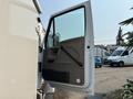A 2006 Sterling Acterra truck with the driver's door open showing the interior handle and panel设计