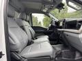 2023 Ford F-450 Super Duty interior with gray leather seats and modern dashboard design