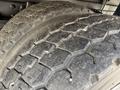 Close-up of two heavy-duty tires with deep treads showcasing wear and tear on a vehicle from 2008 International CityStar