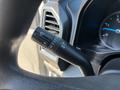 Close-up of a turn signal and headlight control stalk from a 2017 Ford F-550 with various settings displayed on the dial