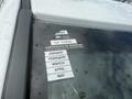 A 2011 Dodge Ram 5500 with a certificate of approval sticker on the windshield showcasing expiration months January to May