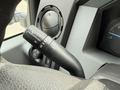 Close-up of the control stalk in a 2011 Ford F-250 SD for windshield wipers and turn signals