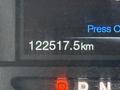 The dashboard display of a 2019 Ford F-350 SD showing a mileage reading of 122517.5 km