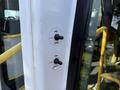 Control panel with two toggle switches labeled for operating a door and ramp on a vehicle, featuring open close and stow deploy functions