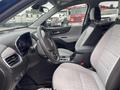 Interior view of a 2022 Chevrolet Equinox featuring gray fabric seats and a modern dashboard with a steering wheel and control panel