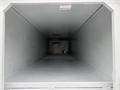 A 2020 International MV607 with an empty cargo area featuring a gray interior and a visible light fixture at the far end