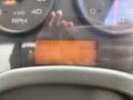 Dashboard of a 2012 International DuraStar 4300 displaying the RPM gauge and an hour meter reading 0 hours