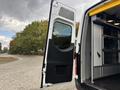 A 2020 Mercedes-Benz Sprinter 2500 van with its rear door open showing the interior space and storage options