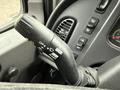 Close-up of a black multifunction control stalk with various settings labeled including off push and pull flash designed for a 2019 Freightliner M2