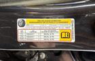 A 2017 Chevrolet Tahoe tire information sticker displaying details about tire pressure and load capacity