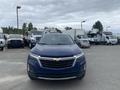 A 2022 Chevrolet Equinox in blue facing forward with a sleek design and the Chevrolet logo visible on the grille