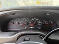 Dashboard of a 2008 Ford Econoline showing speedometer odometer and various gauges