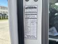 Service sticker for a 2018 Hino 195 showing details like date, mileage, oil filter, and other maintenance checks