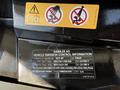 2019 Mercedes-Benz Sprinter with vehicle emission control information label visible in the foreground