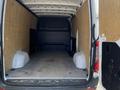 2022 Mercedes-Benz Sprinter van interior with empty cargo space featuring wooden walls and a flat floor