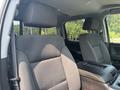 Interior view of a 2017 Chevrolet Silverado 1500 showing front seats and center console with a focus on the upholstery and design