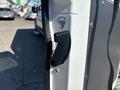 2020 RAM ProMaster 3500 door handle with a pull symbol indicating how to open the door