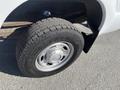 Close-up of the front tire of a 2016 Ford F-250 SD showcasing the tire tread and aluminum wheel rim