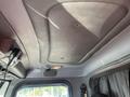 Interior view of a 2009 Peterbilt Highway truck showing the ceiling with a textured surface and a light fixture